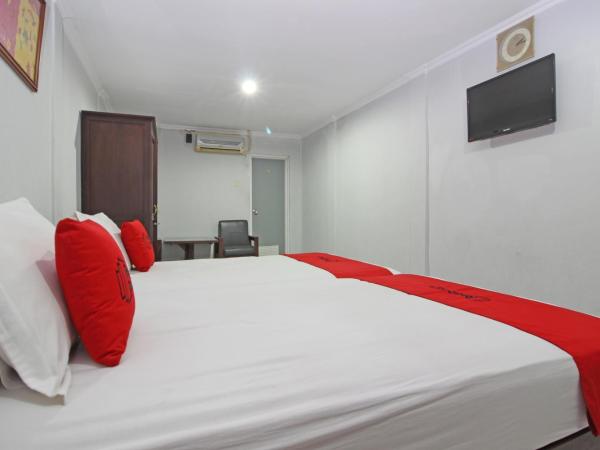 RedDoorz near Terminal Condong Catur : photo 2 de la chambre chambre lits jumeaux supérieure