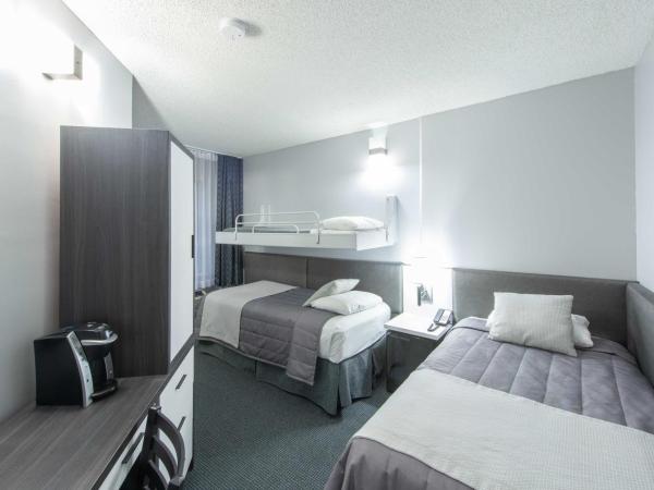 Travelodge by Wyndham Montreal Centre : photo 1 de la chambre chambre triple avec 3 lits simples - non-fumeurs