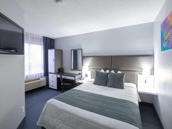 Travelodge by Wyndham Montreal Centre : photo 1 de la chambre chambre lit queen-size - non-fumeurs