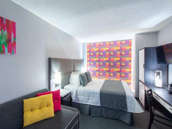 Travelodge by Wyndham Montreal Centre : photo 9 de la chambre chambre lit queen-size d'angle avec canapé-lit - non-fumeurs