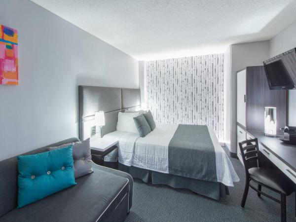 Travelodge by Wyndham Montreal Centre : photo 1 de la chambre chambre lit queen-size d'angle avec canapé-lit - non-fumeurs