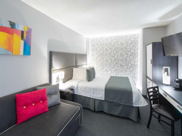 Travelodge by Wyndham Montreal Centre : photo 5 de la chambre chambre lit queen-size d'angle avec canapé-lit - non-fumeurs