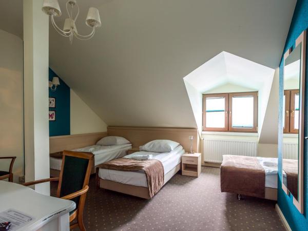 Dworek Jabłonna : photo 4 de la chambre chambre triple confort