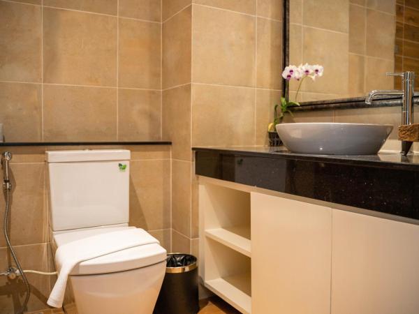 Phor Liang Meun Terracotta Arts : photo 2 de la chambre chambre lits jumeaux de luxe avec balcon