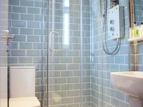 The Dark Horse Pub : photo 6 de la chambre chambre lit king-size