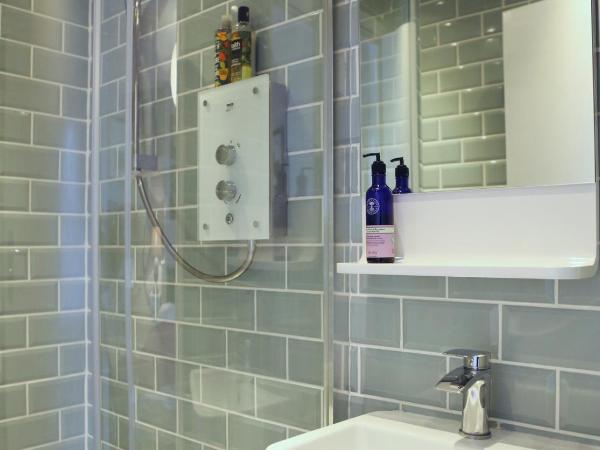 The Dark Horse Pub : photo 1 de la chambre chambre lit king-size