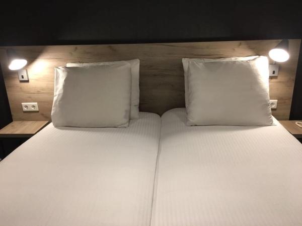 Joy Hotel : photo 2 de la chambre chambre lits jumeaux deluxe