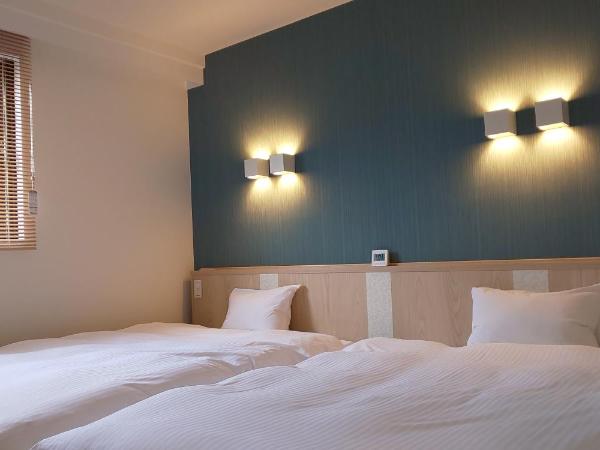 Ueno First City Hotel : photo 3 de la chambre chambre lits jumeaux deluxe