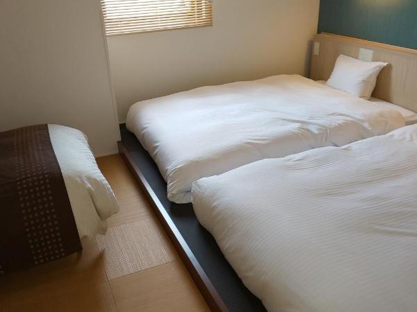 Ueno First City Hotel : photo 4 de la chambre chambre lits jumeaux deluxe