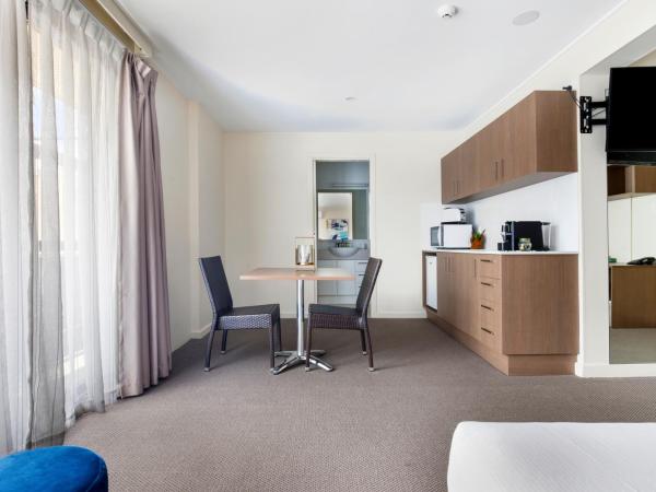 The Metropolitan Spring Hill : photo 2 de la chambre suite lit king-size