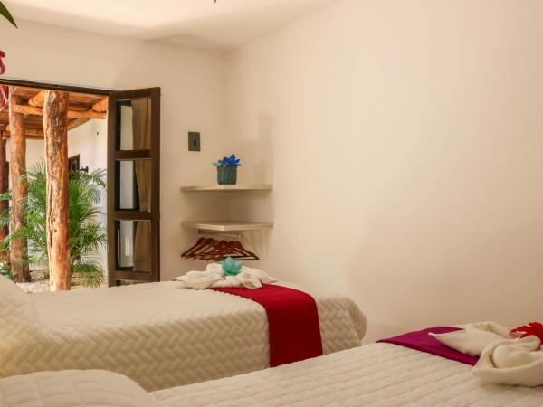 Kin Ha Tulum Hotel : photo 8 de la chambre chambre lits jumeaux