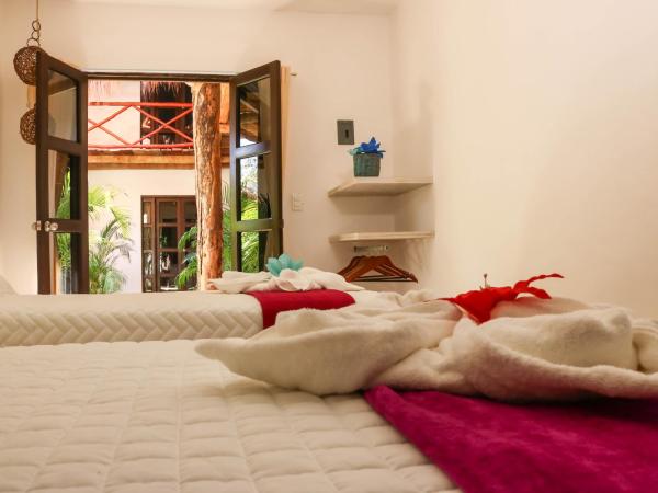 Kin Ha Tulum Hotel : photo 7 de la chambre chambre lits jumeaux