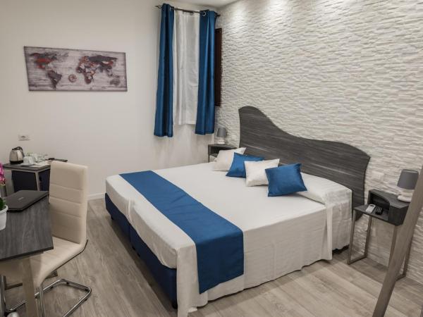 B&B Elegance : photo 10 de la chambre chambre double ou lits jumeaux avec salle de bains