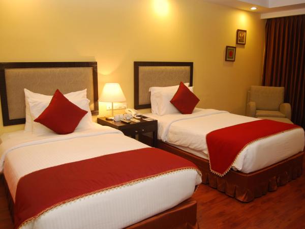 Gokulam Park Sabari-Siruseri SIPCOT : photo 4 de la chambre deluxe twin room with free drop to sipcot it park