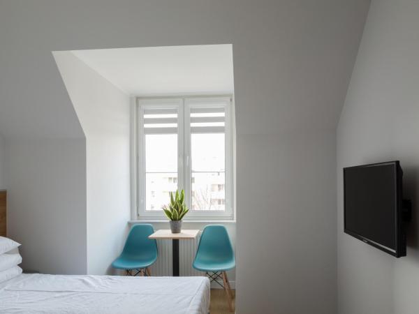 MoHo XL : photo 2 de la chambre chambre double ou lits jumeaux avec salle de bains