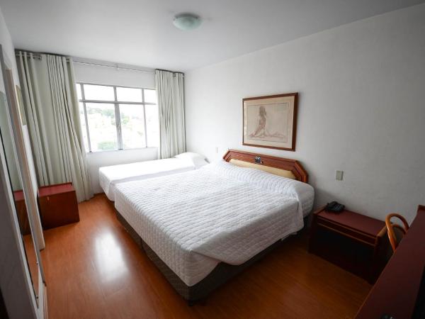 Caravelle Palace Hotel : photo 1 de la chambre chambre triple standard avec 1 lit double et 1 lit simple