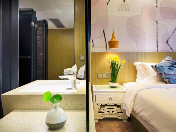 Paco Hotel Jiangtai Lu Metro Guangzhou ---Free Shuttle Bus For CantonFair : photo 4 de la chambre chambre lit queen-size deluxe