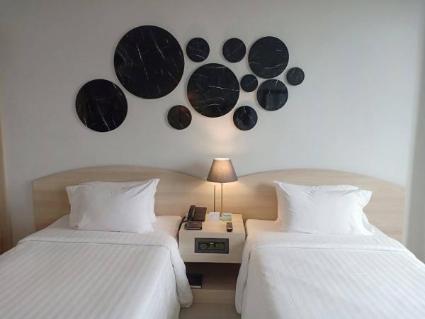 The Maruay Garden Hotel : photo 10 de la chambre chambre double ou lits jumeaux deluxe - vue sur ville 