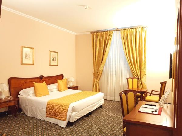 Hotel Berchielli : photo 1 de la chambre chambre triple