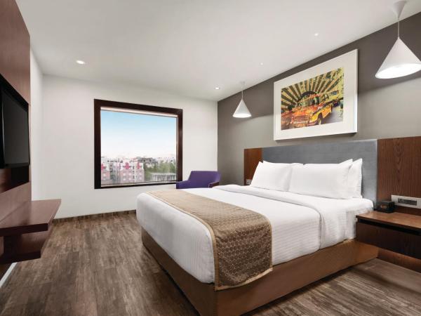 Howard Johnson by Wyndham, Kolkata Airport : photo 4 de la chambre premier queen room - non-smoking with 20% discount on f&b and spa