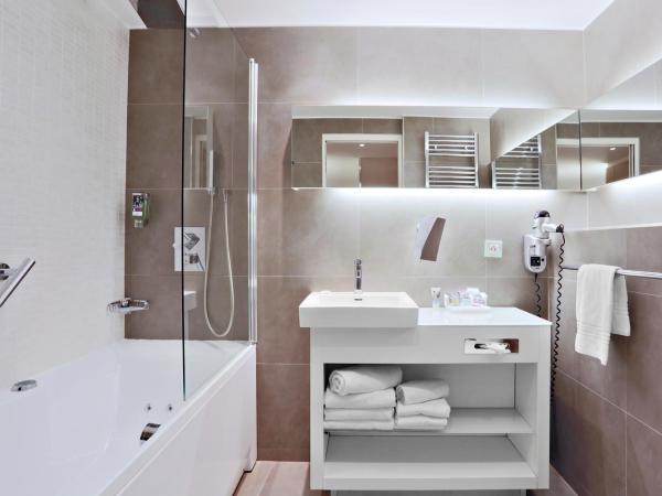 Mercure Paris Vaugirard Porte De Versailles : photo 6 de la chambre suite lit king-size avec canapé-lit