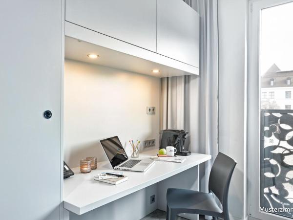 H.ome Serviced Apartments München : photo 10 de la chambre studio