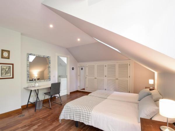 Villa Antumalal B&B : photo 6 de la chambre chambre double ou lits jumeaux - vue sur jardin