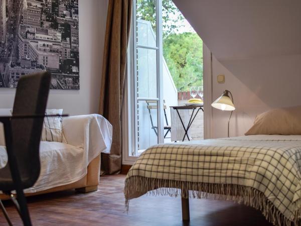 Villa Antumalal B&B : photo 2 de la chambre chambre double ou lits jumeaux - vue sur jardin