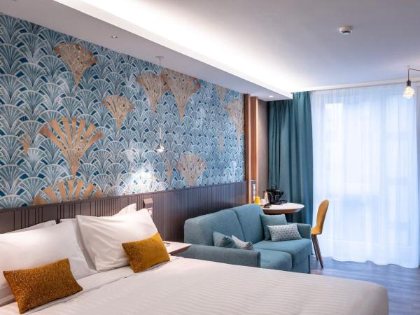voco Strasbourg Centre - The Garden by IHG : photo 5 de la chambre chambre premium lit queen-size avec canapé-lit