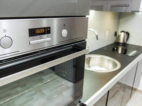 Apartment Sunny Spell : photo 10 de la chambre studio lit queen-size de luxe