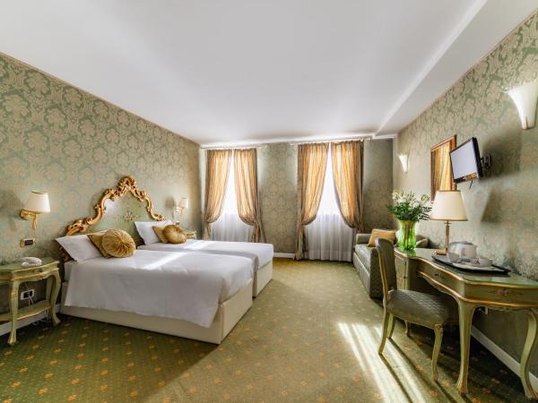 A Tribute To Music Residenza : photo 9 de la chambre chambre familiale triple - vue sur canal