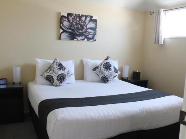 ASURE Abbella Lodge Motel : photo 4 de la chambre appartement 1 chambre avec baignoire spa