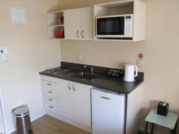 ASURE Abbella Lodge Motel : photo 7 de la chambre appartement 1 chambre avec baignoire spa