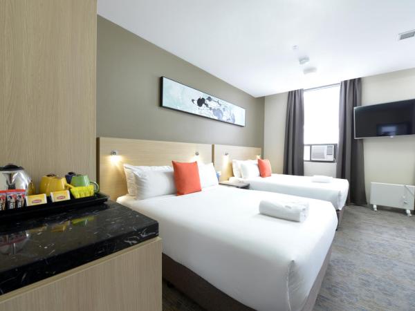 ibis Budget - Melbourne CBD : photo 4 de la chambre chambre double avec 2 lits doubles - accessible aux personnes à mobilité réduite