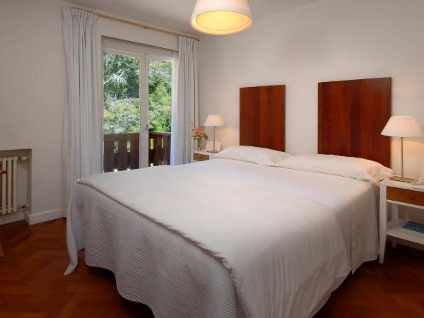 Hotel Tunquelén : photo 1 de la chambre chambre double ou lits jumeaux supérieure avec vue sur la forêt