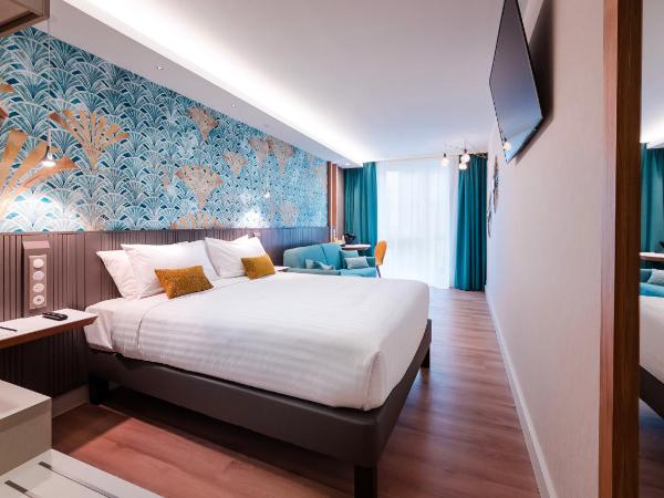voco Strasbourg Centre - The Garden by IHG : photo 1 de la chambre chambre premium lit queen-size avec canapé-lit