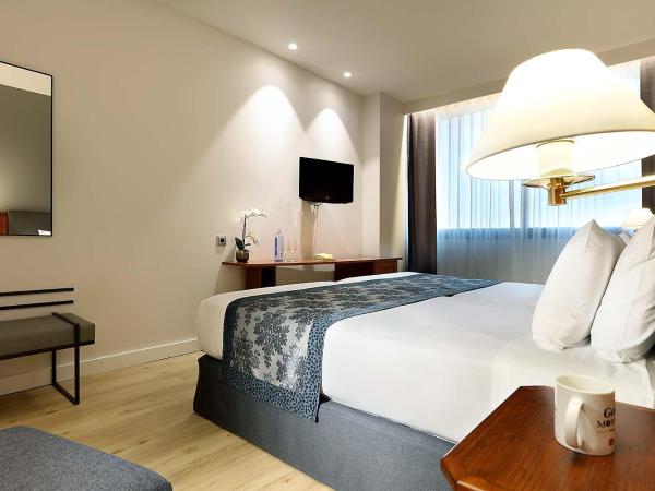 Exe Isla Cartuja : photo 5 de la chambre chambre lits jumeaux