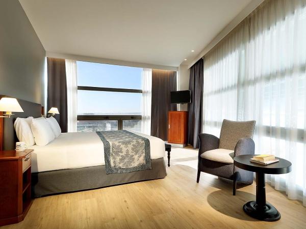 Exe Isla Cartuja : photo 3 de la chambre chambre lits jumeaux