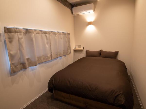 Guesthouse Akicafe Inn : photo 1 de la chambre chambre double Économique