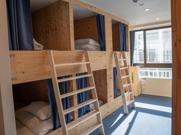 Guesthouse Akicafe Inn : photo 7 de la chambre lit superposé dans dortoir mixte