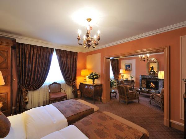 Hôtel de la Cigogne : photo 1 de la chambre suite avec lits jumeaux