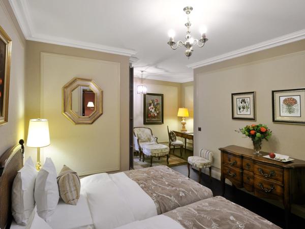 Hôtel de la Cigogne : photo 7 de la chambre chambre lits jumeaux classique