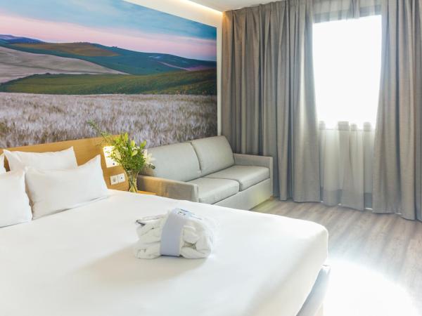 Novotel Sevilla : photo 4 de la chambre chambre lit queen-size exécutive avec canapé-lit