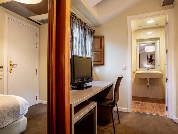 Ikonik Plaza Mercado : photo 2 de la chambre chambre simple