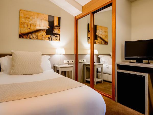 Ikonik Plaza Mercado : photo 1 de la chambre chambre simple