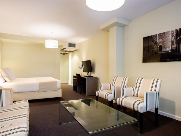 Ikonik Plaza Mercado : photo 1 de la chambre chambre double ou lits jumeaux supérieure