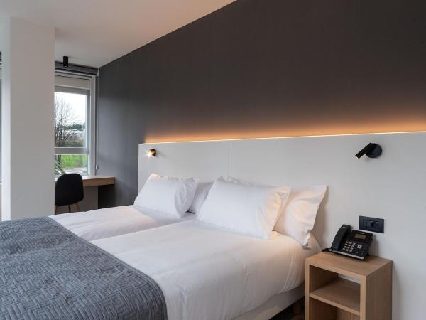 Hotel Distrito Oeste : photo 9 de la chambre chambre lits jumeaux