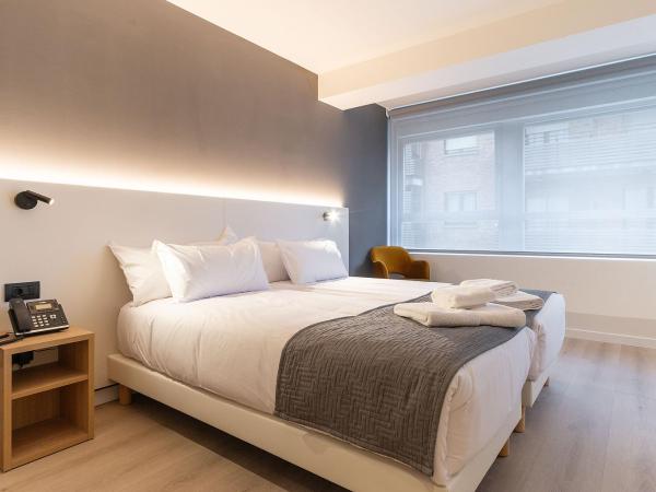 Hotel Distrito Oeste : photo 4 de la chambre chambre lits jumeaux