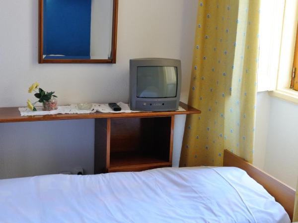 Residencial Moderna : photo 1 de la chambre chambre triple
