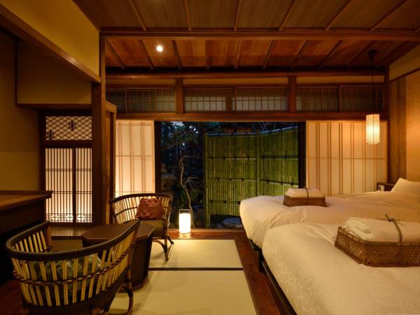 Muromachi Yutone Kyokoyado : photo 1 de la chambre chambre lits jumeaux avec salle de bains privative et tatami au sol - usuzakura